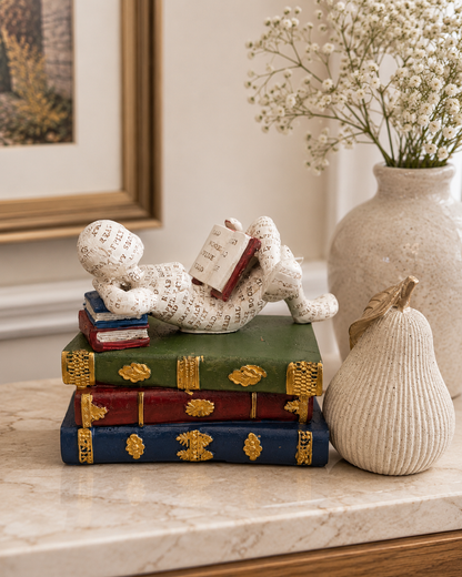 Reading Thinker Figurine on Books