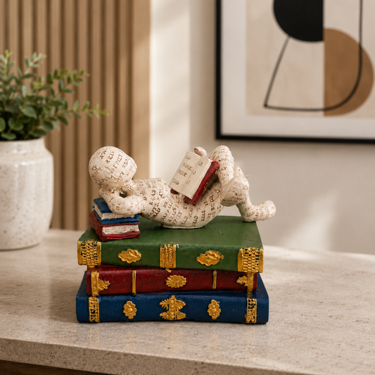 Reading Thinker Figurine on Books